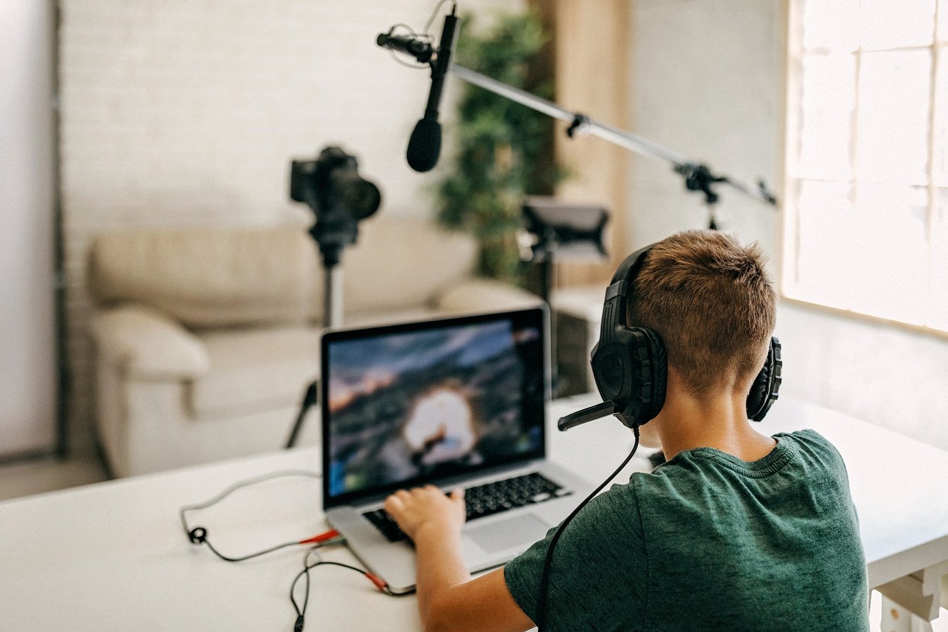 Kid recording his gameplay for vlog